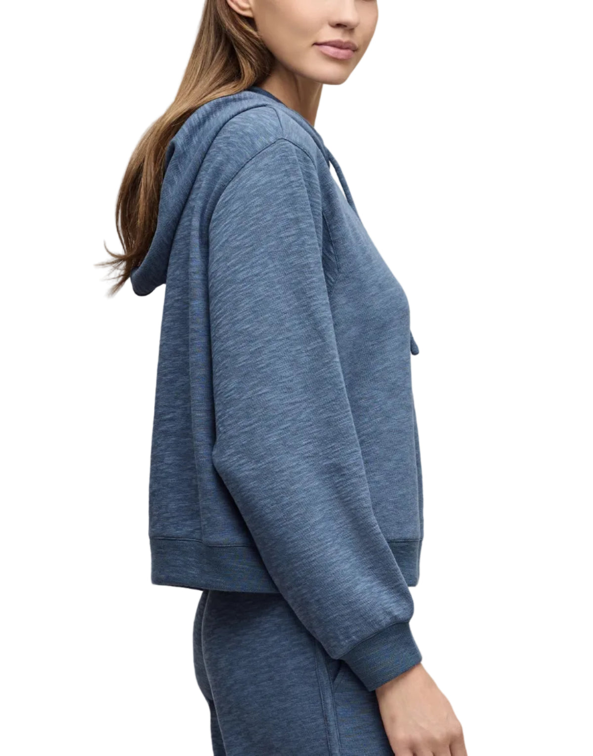 Woman wearing a blue hoodie on a white background