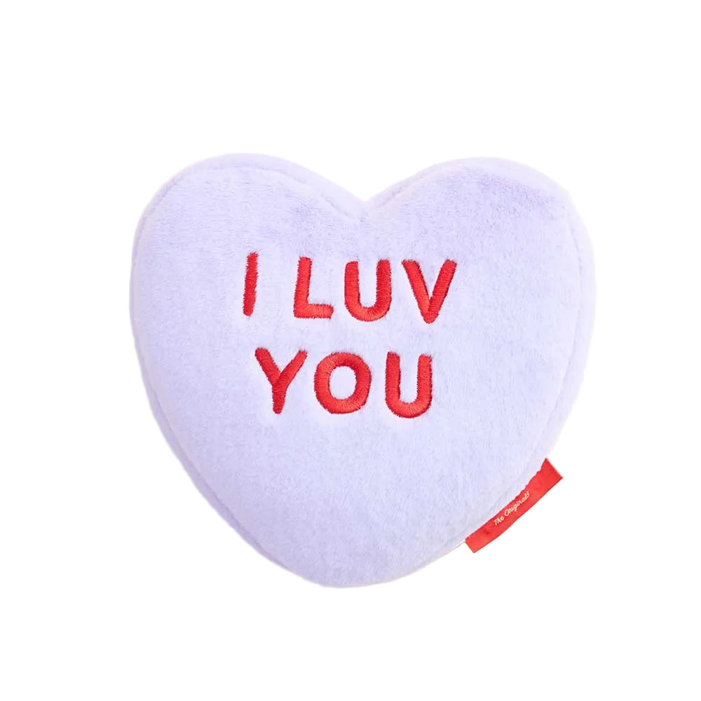 Heart-shaped plush toy with 'I LUV YOU' text on a light purple background