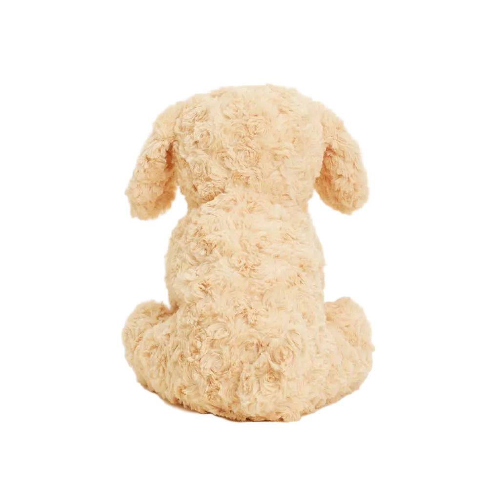 Beige plush toy dog on a white background